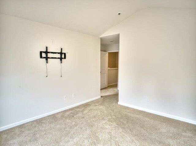 314 Sea Isle Pl, Greer, SC 29650 - carpeted empty room featuring lofted ceiling and fire sprinkler in ceiling