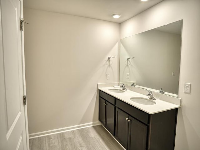 314 Sea Isle Pl, Greer, SC 29650 - full bathroom with double vanity and wood finished floors