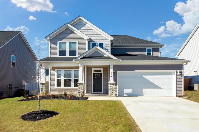 424 Granbury Dr, Duncan, SC 29334 - craftsman-style house with a garage, concrete driveway, a front lawn, and a shingled roof