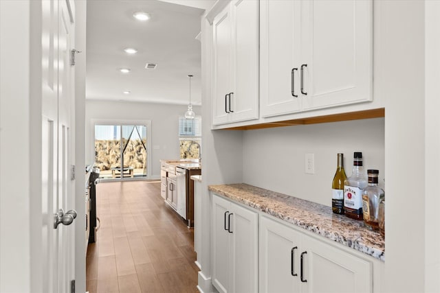 424 Granbury Dr, Duncan, SC 29334 - bar area with wood finished floors, recessed lighting, and hanging light fixtures