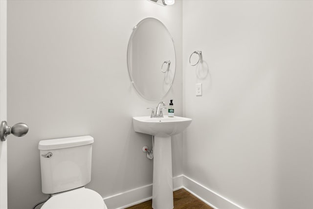 424 Granbury Dr, Duncan, SC 29334 - bathroom featuring baseboards and wood finished floors