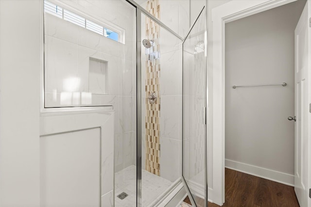 424 Granbury Dr, Duncan, SC 29334 - bathroom featuring a stall shower and wood finished floors