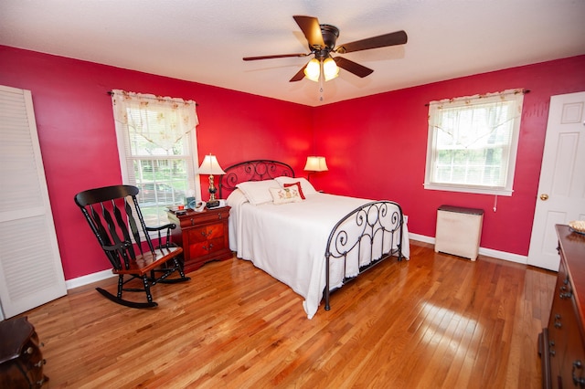 229 Cart Dr, Spartanburg, SC 29307 - bedroom with light wood finished floors and ceiling fan