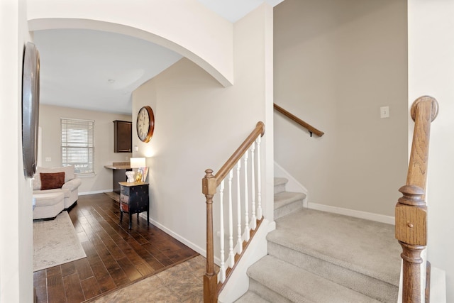 212 Dayside Ct, Greer, SC 29651 - stairs featuring arched walkways and wood finished floors