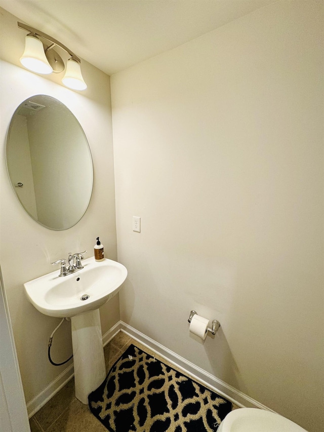 411 Triple Crown Way, Spartanburg, SC 29301 - bathroom featuring baseboards and toilet