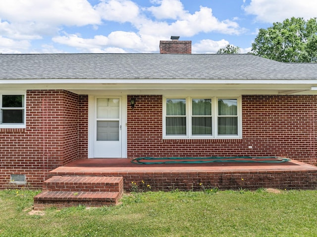 1310 Mount Zion Rd, Spartanburg, SC 29303 - entrance to property with brick siding, a chimney, and roof with shingles