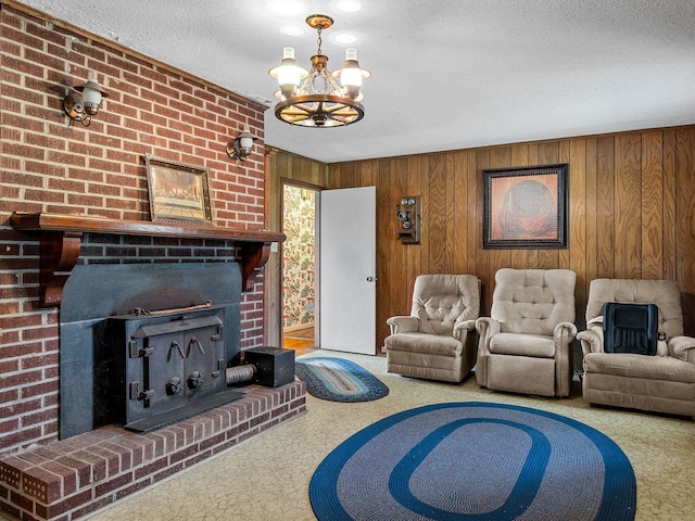 1310 Mount Zion Rd, Spartanburg, SC 29303 - carpeted living area with a textured ceiling, a chandelier, wood walls, and a fireplace