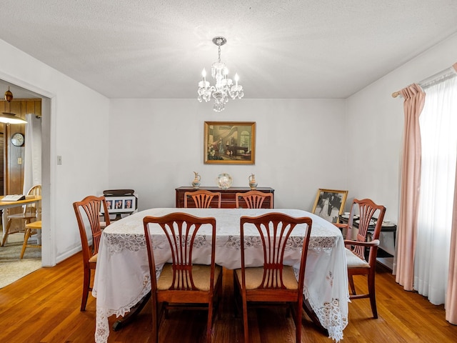 1310 Mount Zion Rd, Spartanburg, SC 29303 - dining space with a chandelier and wood finished floors