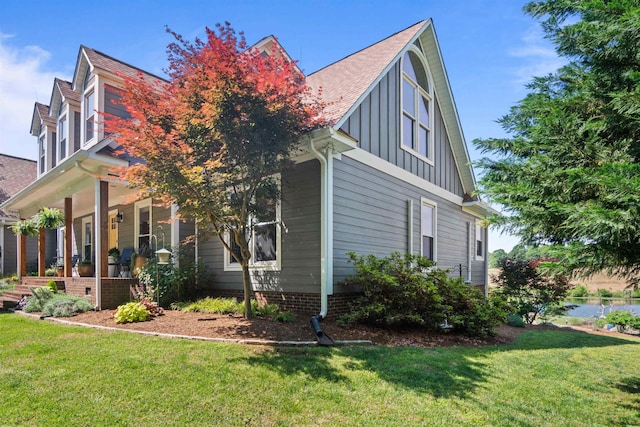 270 Watkins Rd, Campobello, SC 29322 - view of side of property featuring board and batten siding, a porch, a lawn, and roof with shingles