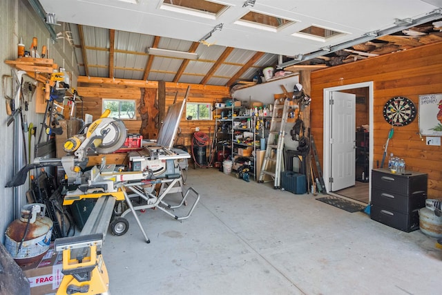 270 Watkins Rd, Campobello, SC 29322 - garage with wood walls and a workshop area