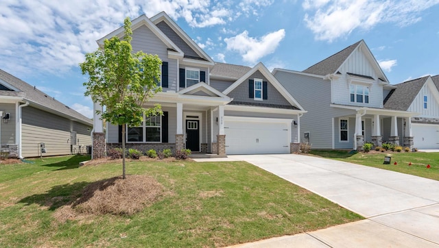 310 Fiery Rd, Mauldin, SC 29607 - craftsman inspired home with a porch, board and batten siding, driveway, a front yard, and brick siding