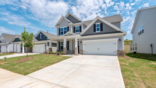 310 Fiery Rd, Mauldin, SC 29607 - craftsman-style house featuring covered porch, driveway, and a front yard