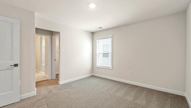 310 Fiery Rd, Mauldin, SC 29607 - unfurnished bedroom featuring light colored carpet and baseboards