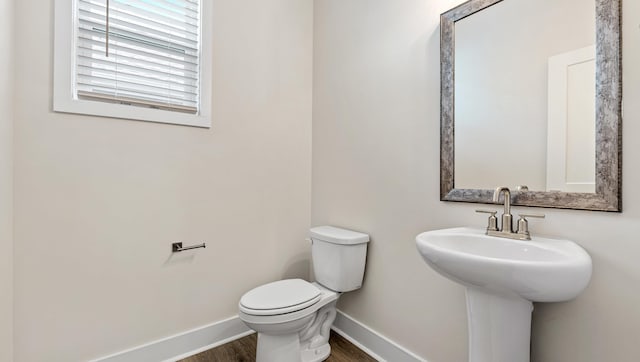310 Fiery Rd, Mauldin, SC 29607 - half bathroom with baseboards and wood finished floors