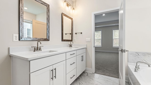 310 Fiery Rd, Mauldin, SC 29607 - bathroom with marble finish flooring, double vanity, a garden tub, and recessed lighting