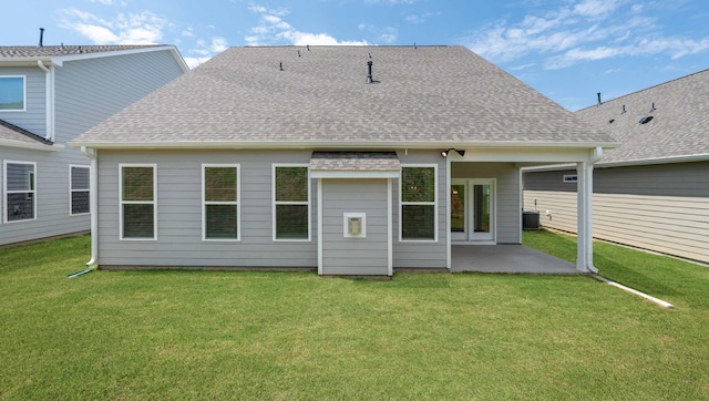 310 Fiery Rd, Mauldin, SC 29607 - rear view of property with a shingled roof, a patio area, and a lawn