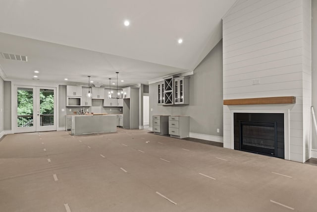 2032 Ivy Cottage Path, Boiling Springs, SC 29316 - unfurnished living room featuring recessed lighting, a fireplace, and vaulted ceiling