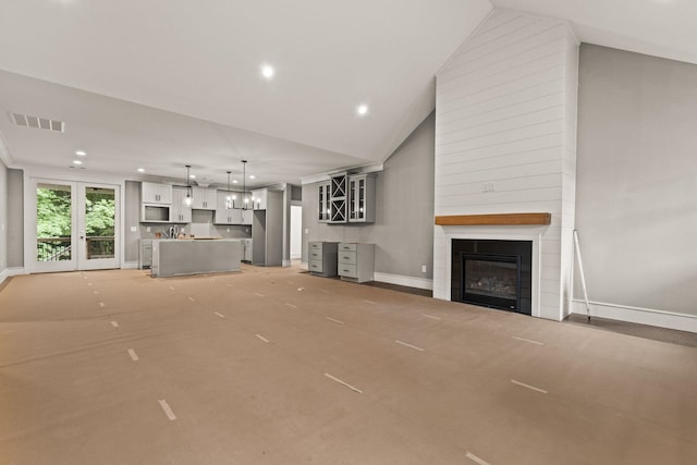2032 Ivy Cottage Path, Boiling Springs, SC 29316 - unfurnished living room featuring a large fireplace, recessed lighting, and high vaulted ceiling