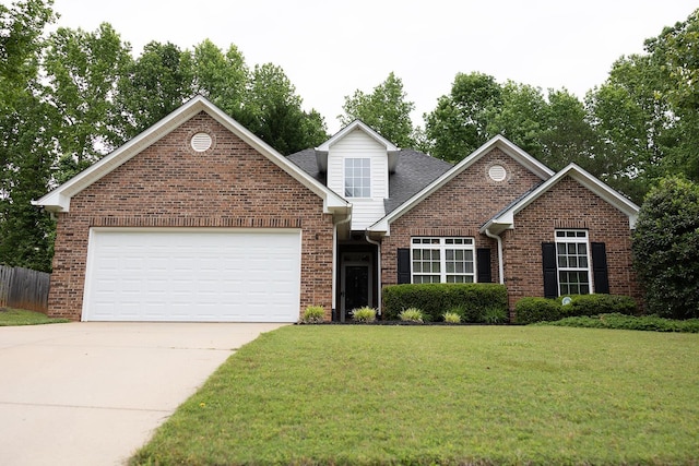 413 N Sweetwater Hills Dr, Moore, SC 29369 - traditional-style house featuring concrete driveway, brick siding, and a garage
