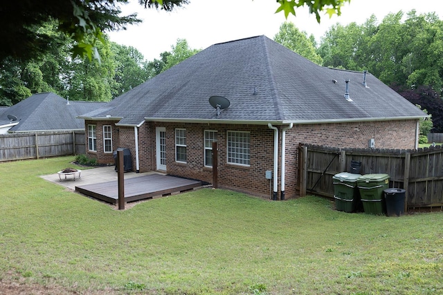 413 N Sweetwater Hills Dr, Moore, SC 29369 - rear view of property with a fire pit, brick siding, a fenced backyard, a deck, and a shingled roof