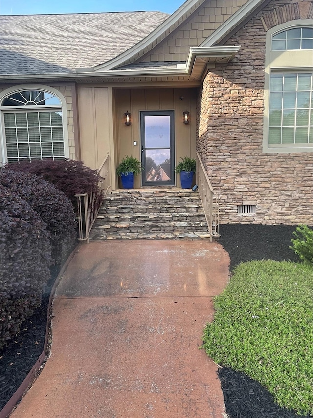 204 Tuscan Ridge Trl, Inman, SC 29349 - property entrance featuring stone siding and roof with shingles