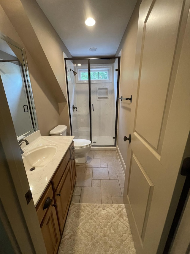 204 Tuscan Ridge Trl, Inman, SC 29349 - full bath with vanity, a shower stall, and stone tile flooring