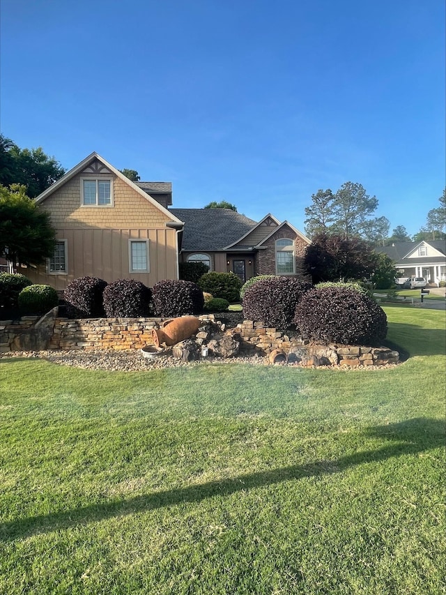 204 Tuscan Ridge Trl, Inman, SC 29349 - view of side of property featuring board and batten siding and a lawn