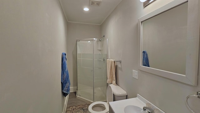 311 Hart St, Union, SC 29379 - full bathroom featuring a shower stall, vanity, wood finished floors, ornamental molding, and recessed lighting