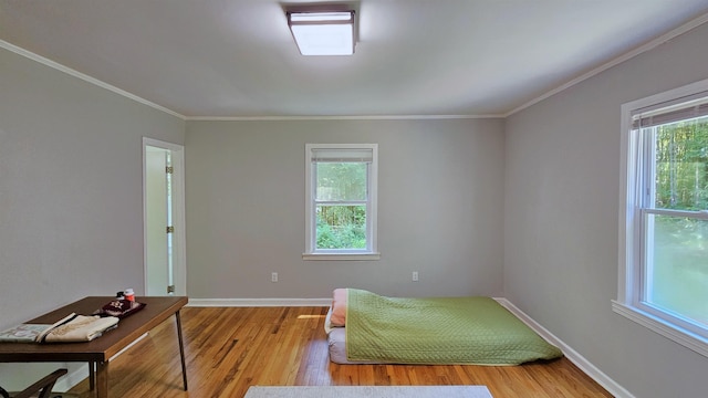 311 Hart St, Union, SC 29379 - bedroom with light wood-style flooring and ornamental molding