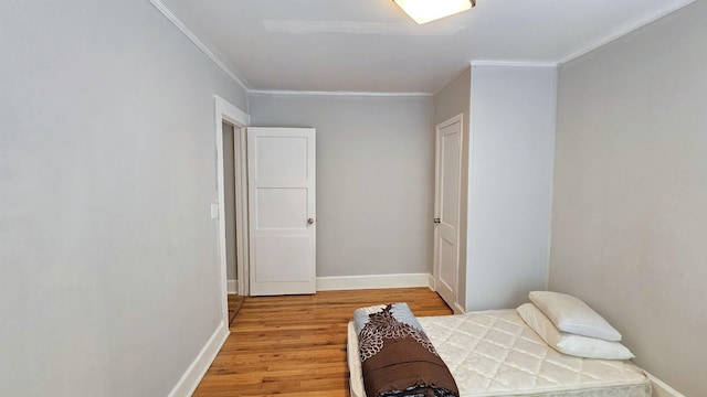 311 Hart St, Union, SC 29379 - bedroom with ornamental molding and light wood-style flooring