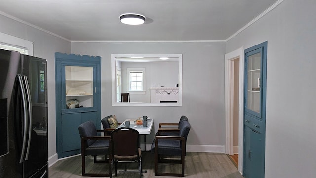 311 Hart St, Union, SC 29379 - dining space featuring wood finished floors, crown molding, and a desk