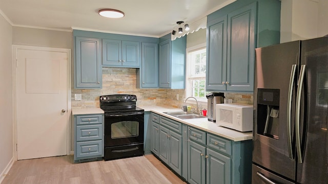311 Hart St, Union, SC 29379 - kitchen with stainless steel fridge with ice dispenser, black electric range oven, white microwave, decorative backsplash, and ornamental molding