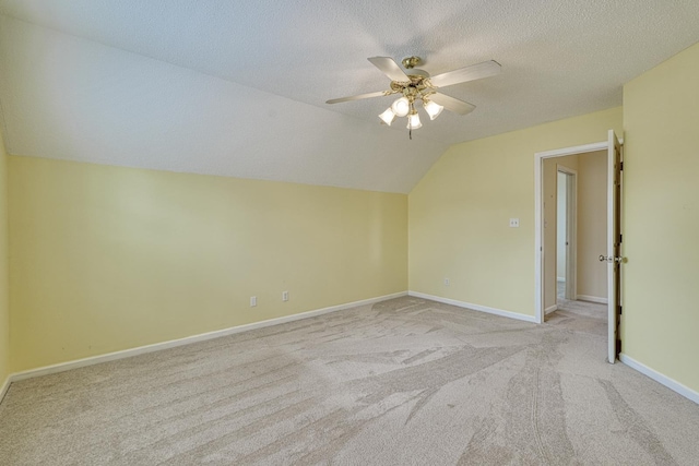 15 Arbours W Ln, Moore, SC 29369 - additional living space with a ceiling fan, light carpet, vaulted ceiling, and a textured ceiling