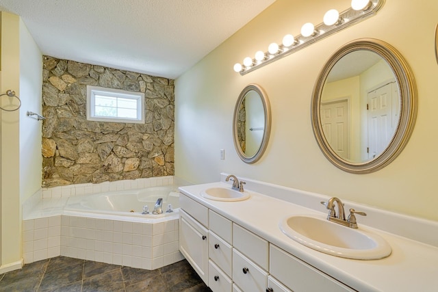 15 Arbours W Ln, Moore, SC 29369 - bathroom with a bath, double vanity, and a textured ceiling