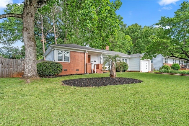 222 Woodview Ave, Spartanburg, SC 29306 - view of front facade featuring crawl space, brick siding, and a chimney
