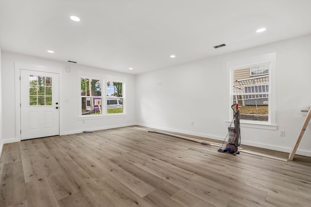 139 Carolina Ave, Spartanburg, SC 29306 - unfurnished living room featuring wood finished floors and recessed lighting