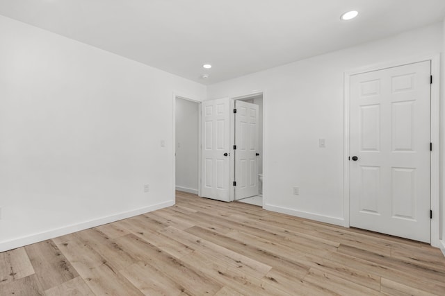 139 Carolina Ave, Spartanburg, SC 29306 - unfurnished bedroom with light wood-style flooring and recessed lighting