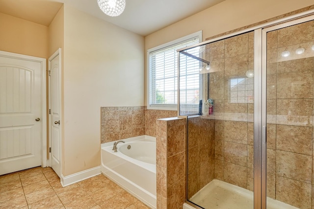 202 Buxton Ct, Easley, SC 29642 - full bath featuring a garden tub, a shower stall, and tile patterned flooring