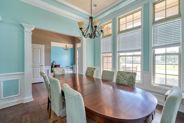 202 Buxton Ct, Easley, SC 29642 - dining space featuring a chandelier, crown molding, wainscoting, dark wood-style floors, and ornate columns