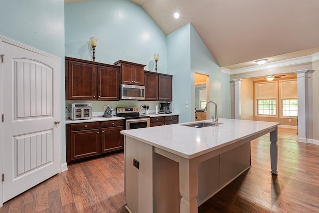 202 Buxton Ct, Easley, SC 29642 - kitchen with appliances with stainless steel finishes, decorative columns, high vaulted ceiling, backsplash, and dark brown cabinetry