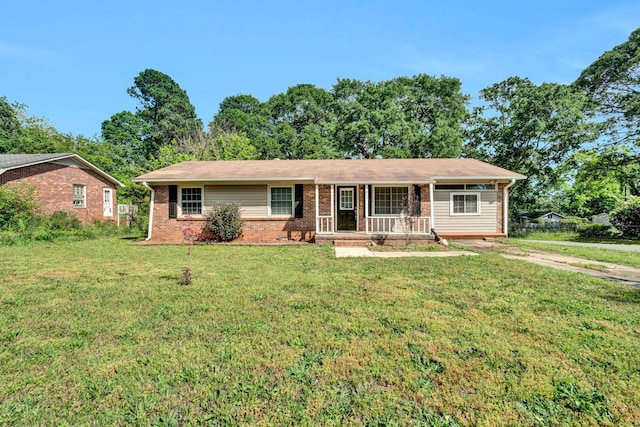211 Skyline Rd, Greer, SC 29651 - ranch-style home with covered porch, brick siding, and a front yard