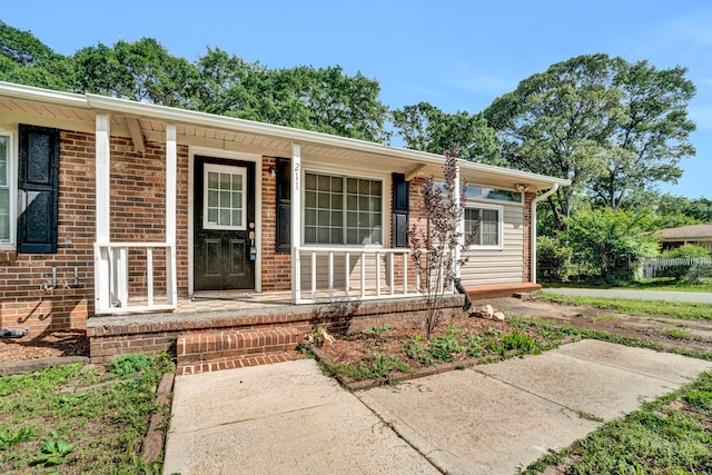 211 Skyline Rd, Greer, SC 29651 - view of front facade featuring a porch and brick siding