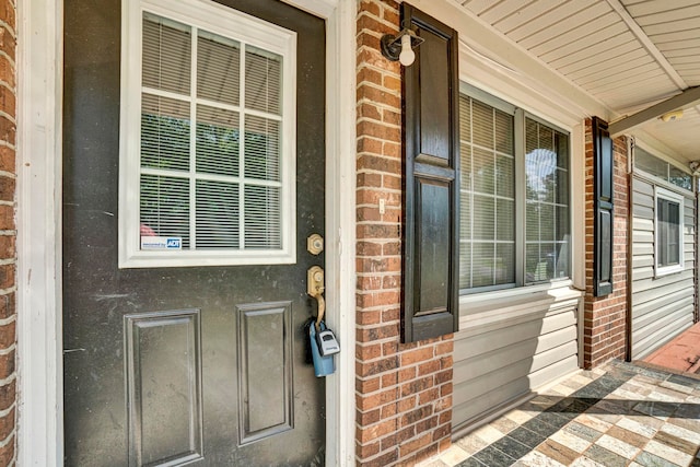 211 Skyline Rd, Greer, SC 29651 - view of exterior entry with brick siding and covered porch