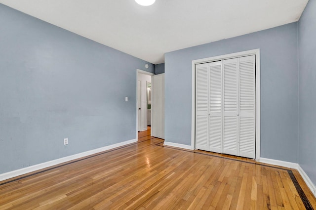 211 Skyline Rd, Greer, SC 29651 - unfurnished bedroom with light wood-style flooring and a closet
