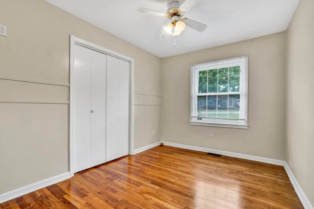 211 Skyline Rd, Greer, SC 29651 - unfurnished bedroom featuring wood finished floors, a closet, and ceiling fan