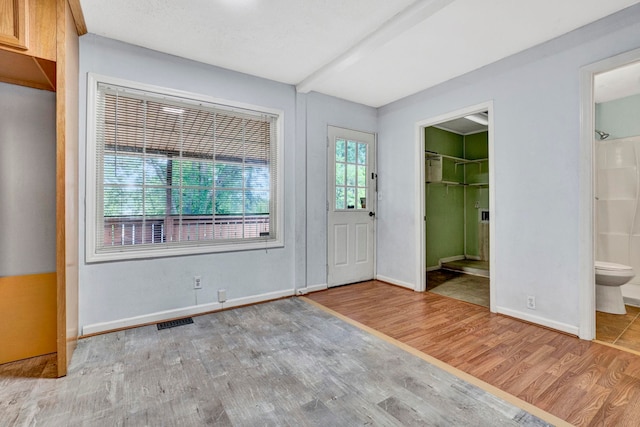 211 Skyline Rd, Greer, SC 29651 - unfurnished bedroom featuring wood finished floors and ensuite bath