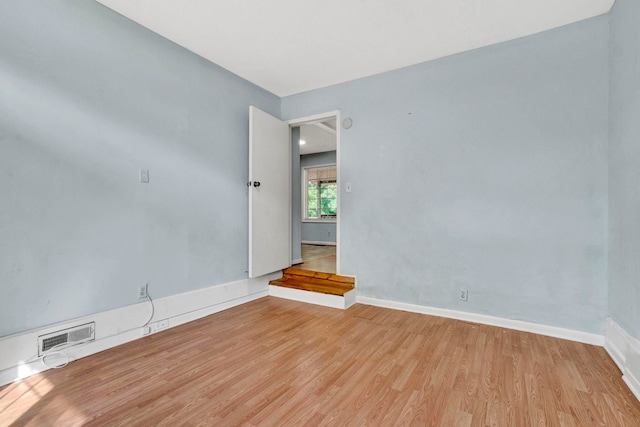211 Skyline Rd, Greer, SC 29651 - spare room featuring wood finished floors and baseboards