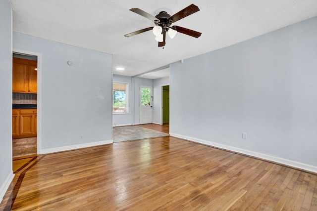 211 Skyline Rd, Greer, SC 29651 - unfurnished living room featuring ceiling fan and light wood-style floors
