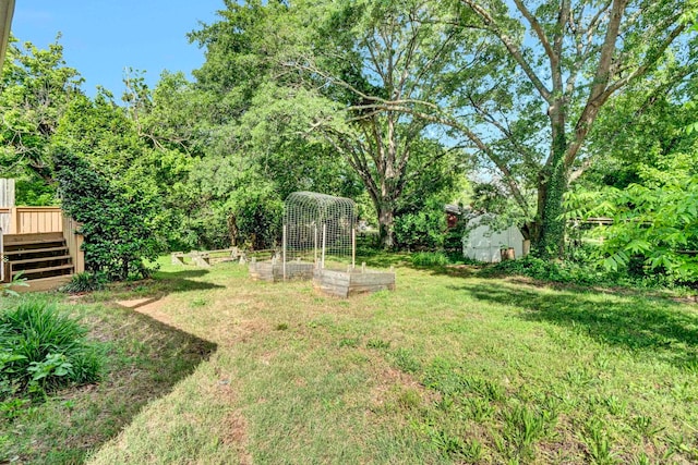 211 Skyline Rd, Greer, SC 29651 - view of green lawn featuring a garden, a deck, a shed, and stairway