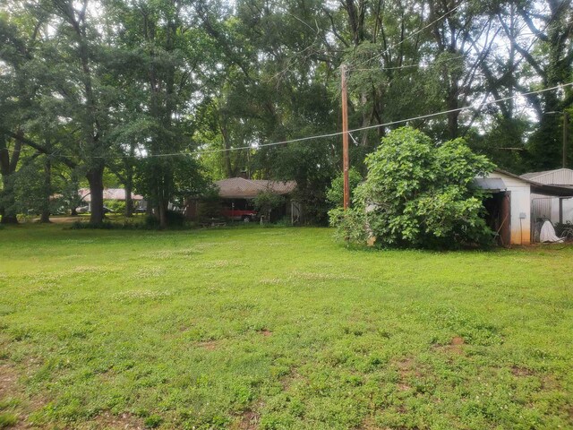 190 Beaverdam Church Rd, Enoree, SC 29335 - view of grassy yard with an outdoor structure